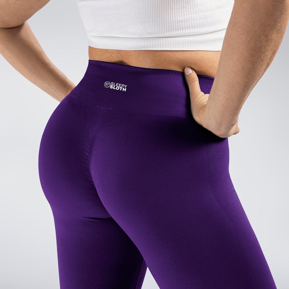 Leggings in purple on model - Evolve Collection activewear