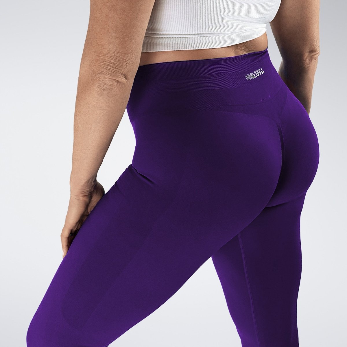 Leggings in purple on model - Evolve Collection activewear