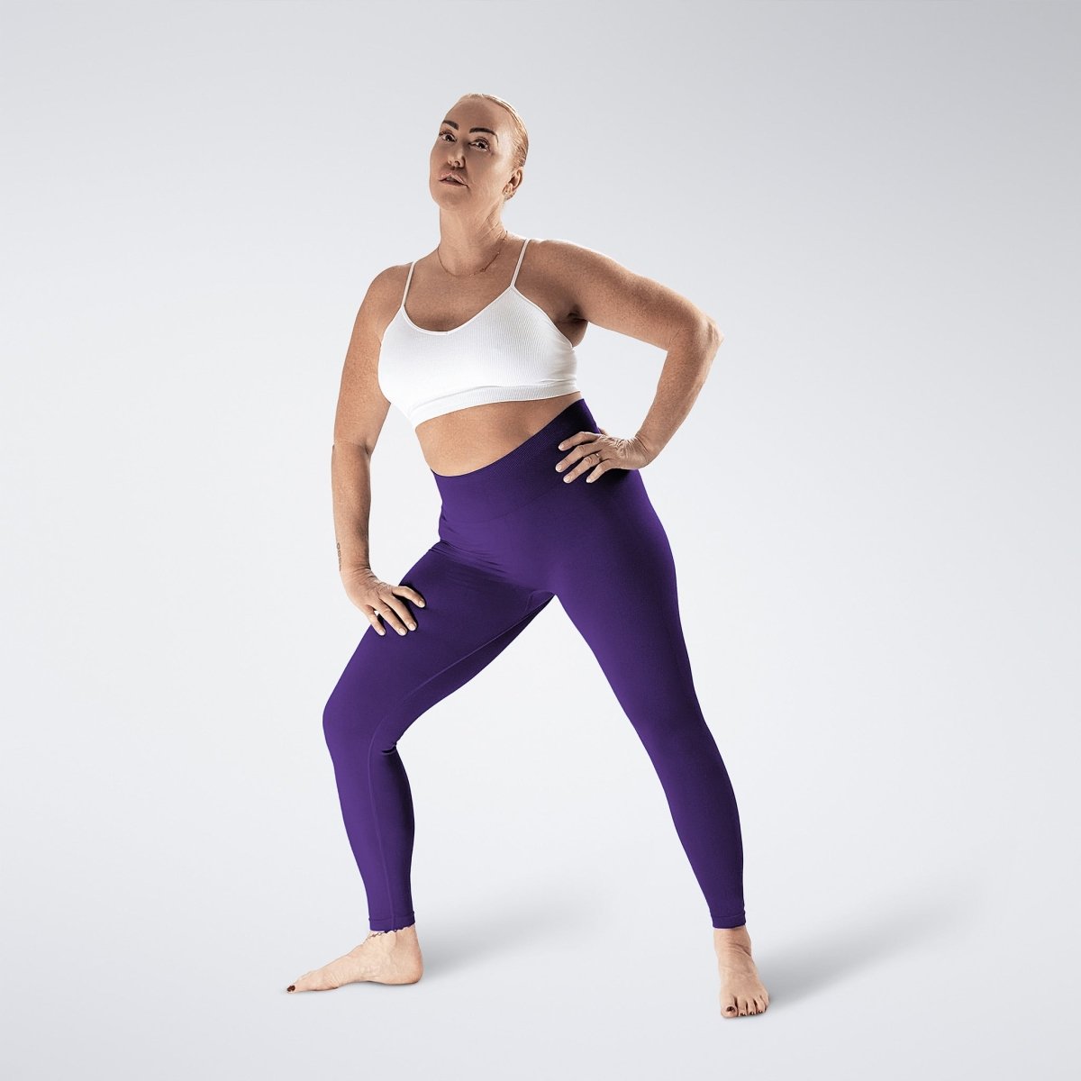 Leggings in purple on model - Evolve Collection activewear