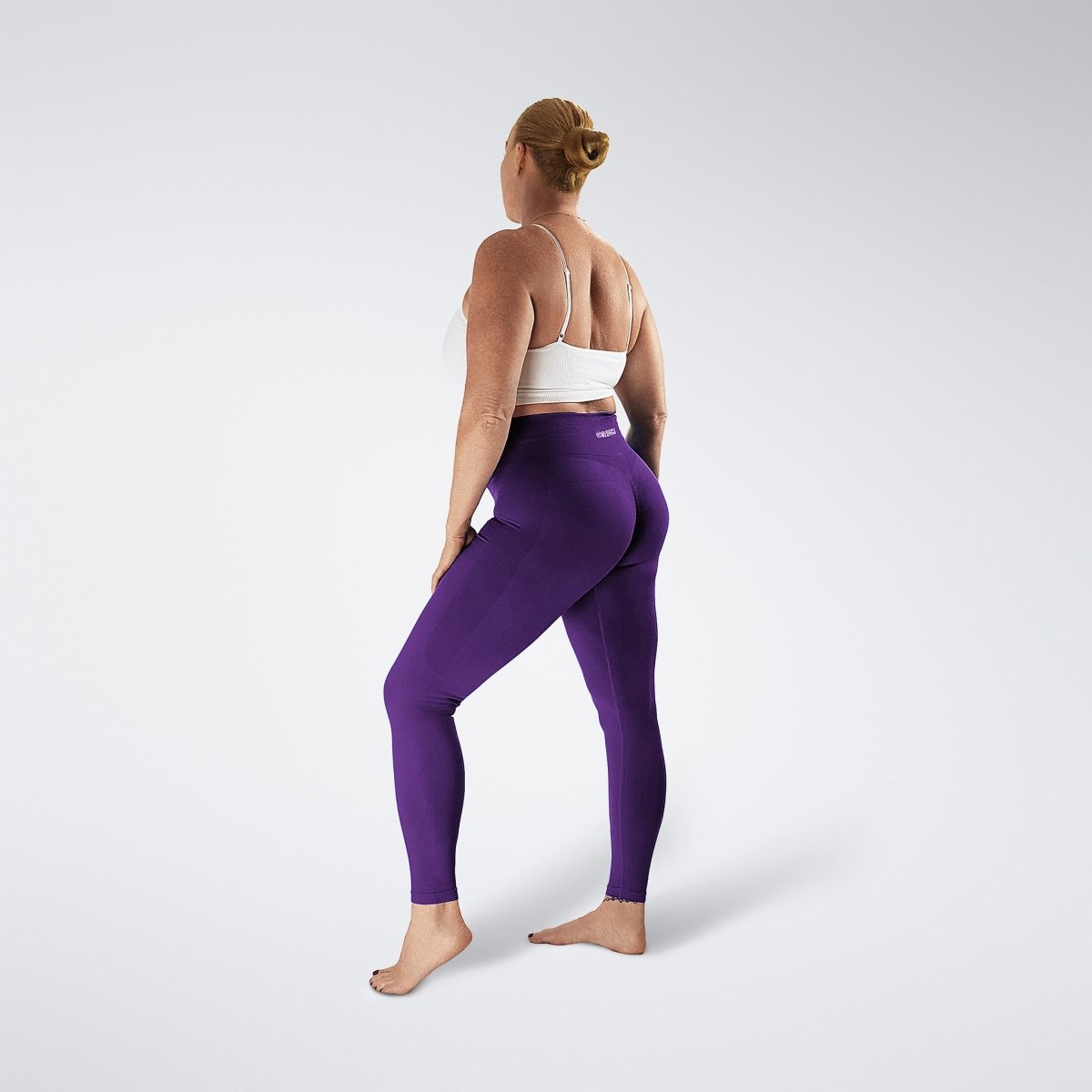 Leggings in purple on model - Evolve Collection activewear