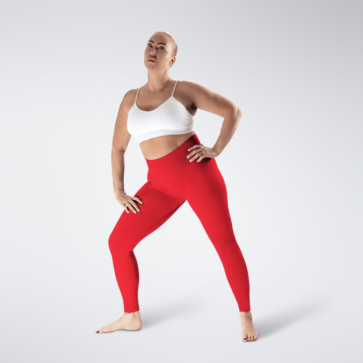 Leggings in red on model - Evolve Collection activewear