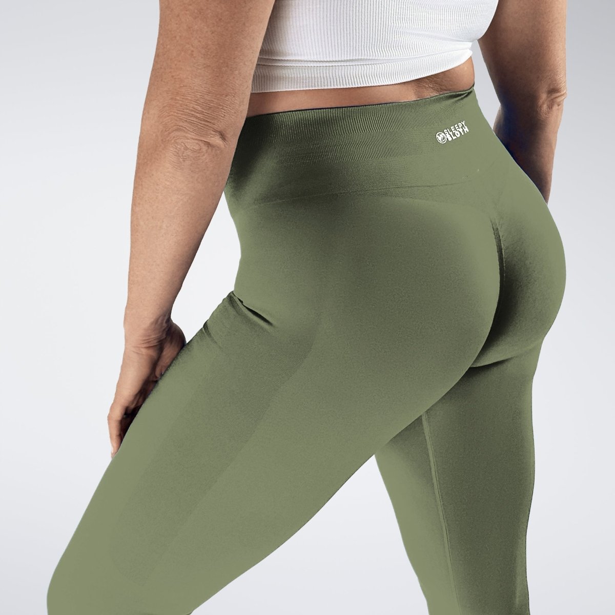 Leggings in soft sage on model - Evolve Collection activewear