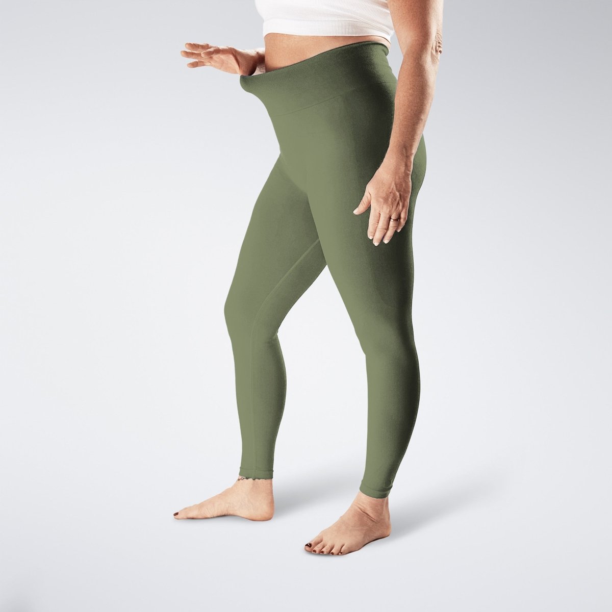 Leggings in soft sage on model - Evolve Collection activewear