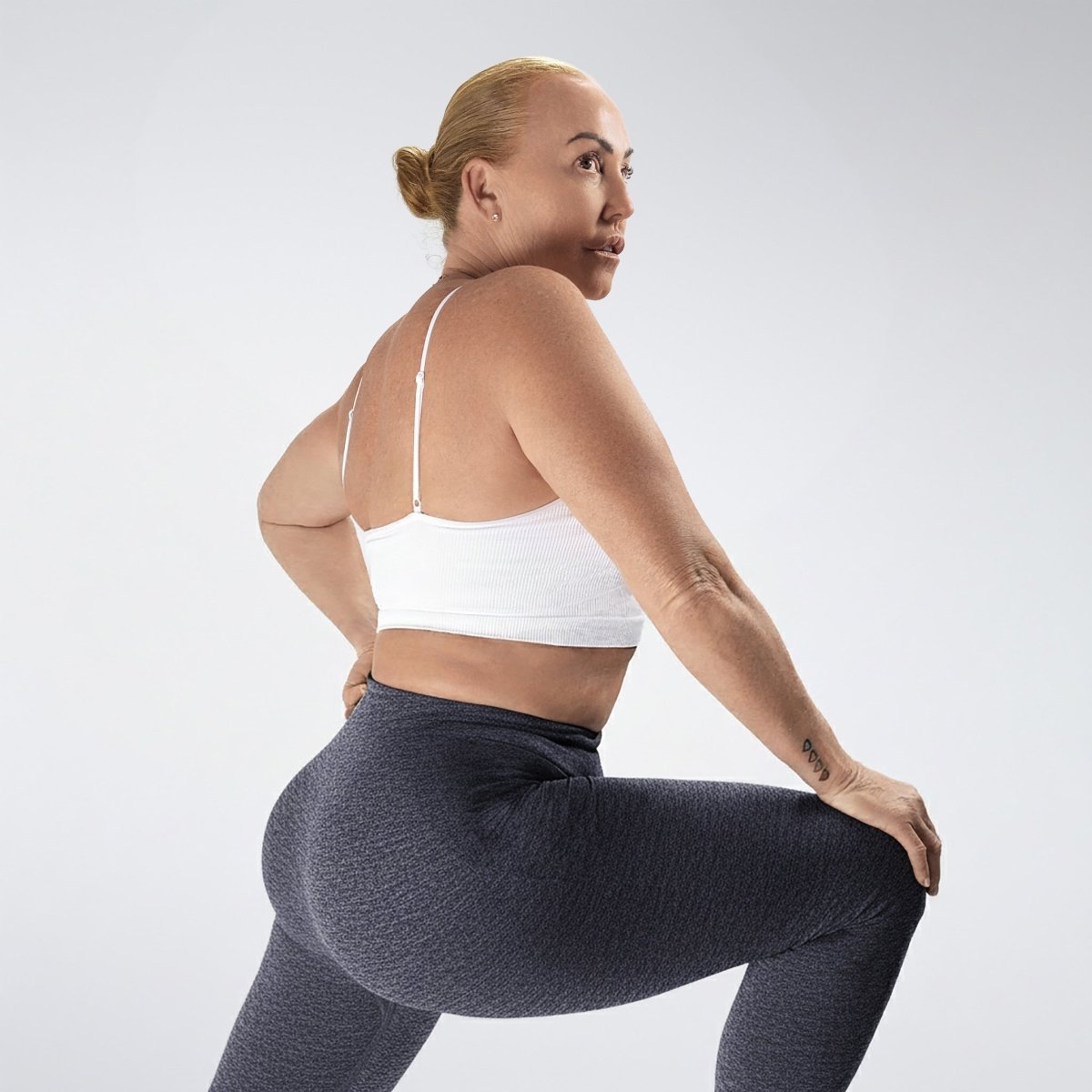 Leggings in deep grey on model - Evolve Collection activewear