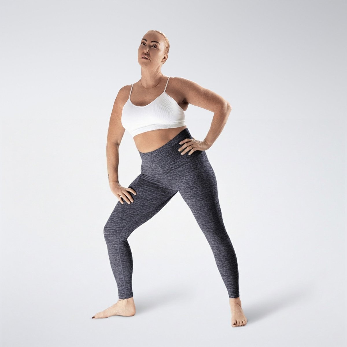 Leggings in deep grey on model - Evolve Collection activewear