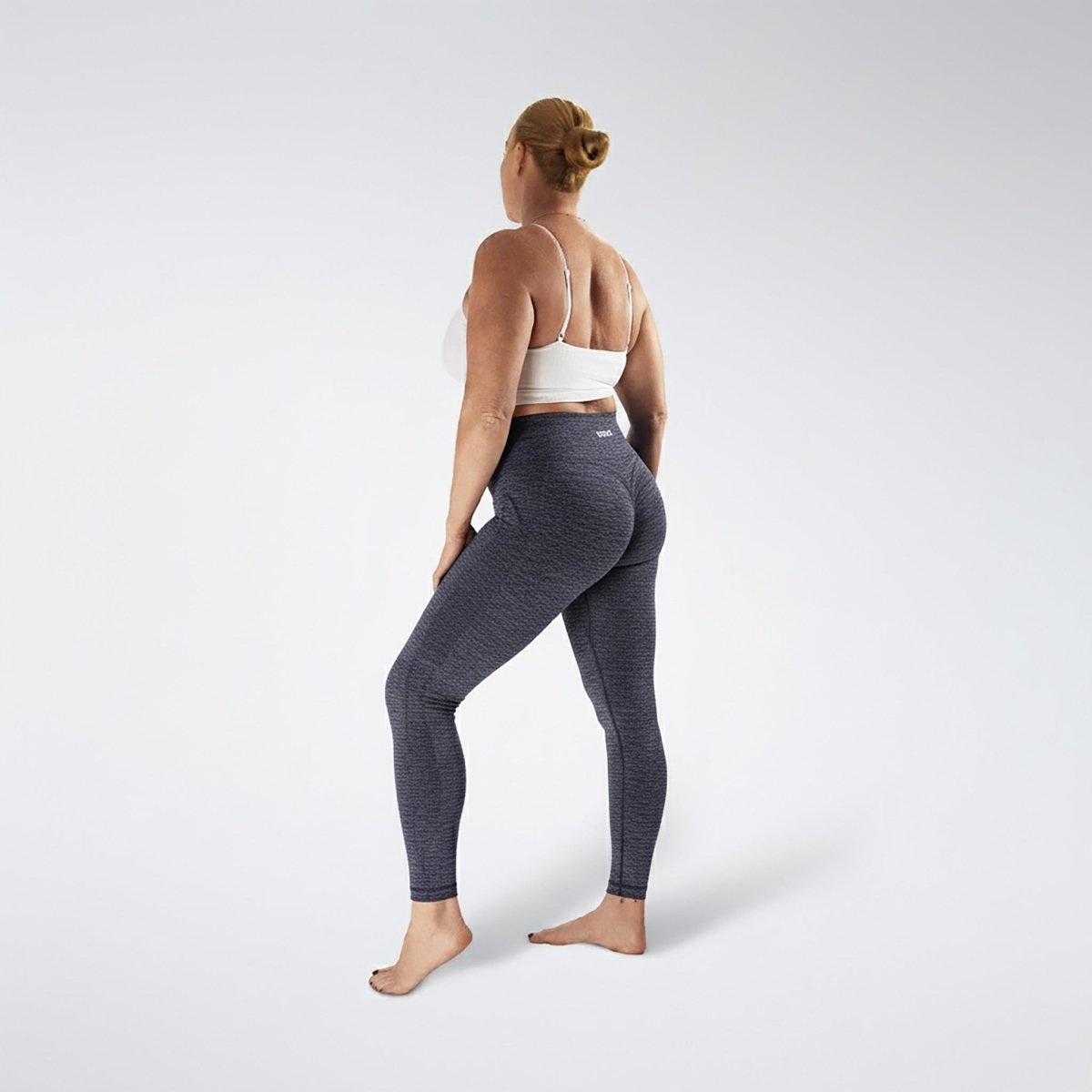 Leggings in deep grey on model - Evolve Collection activewear