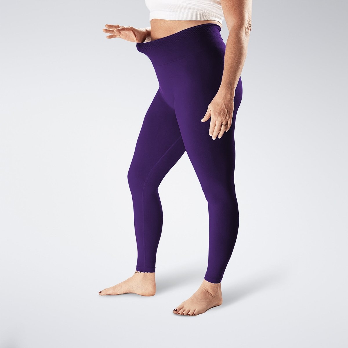 Leggings in purple on model - Evolve Collection activewear