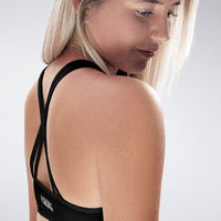 Cross Back Yoga Bra in black on model - Rise Collection activewear