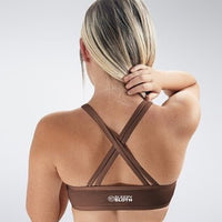 Cross Back Yoga Bra in chocolate brown on model - Rise Collection activewear