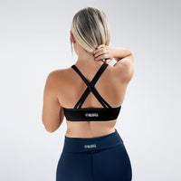 Cross Back Yoga Bra in black on model - Rise Collection activewear