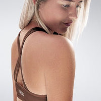 Cross Back Yoga Bra in chocolate brown on model - Rise Collection activewear
