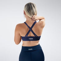 Cross Back Yoga Bra in navy on model - Rise Collection activewear
