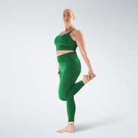 Leggings in forest green on model - Flow State activewear