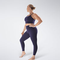Leggings in purple on model - Flow State activewear