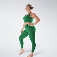 Leggings in forest green on model - Flow State activewear