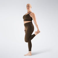 Leggings in chocolate brown on model - Flow State activewear