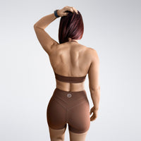 Shorts in chocolate brown on model - Halo Collection activewear