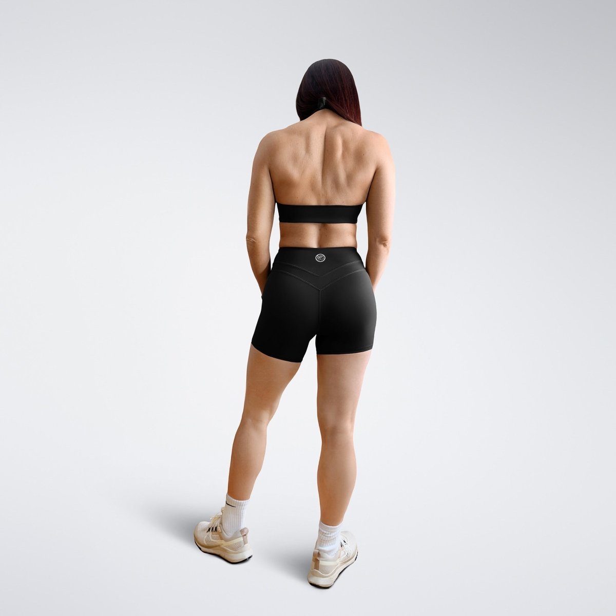 Shorts in black on model - Halo Collection activewear