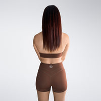 Shorts in chocolate brown on model - Halo Collection activewear