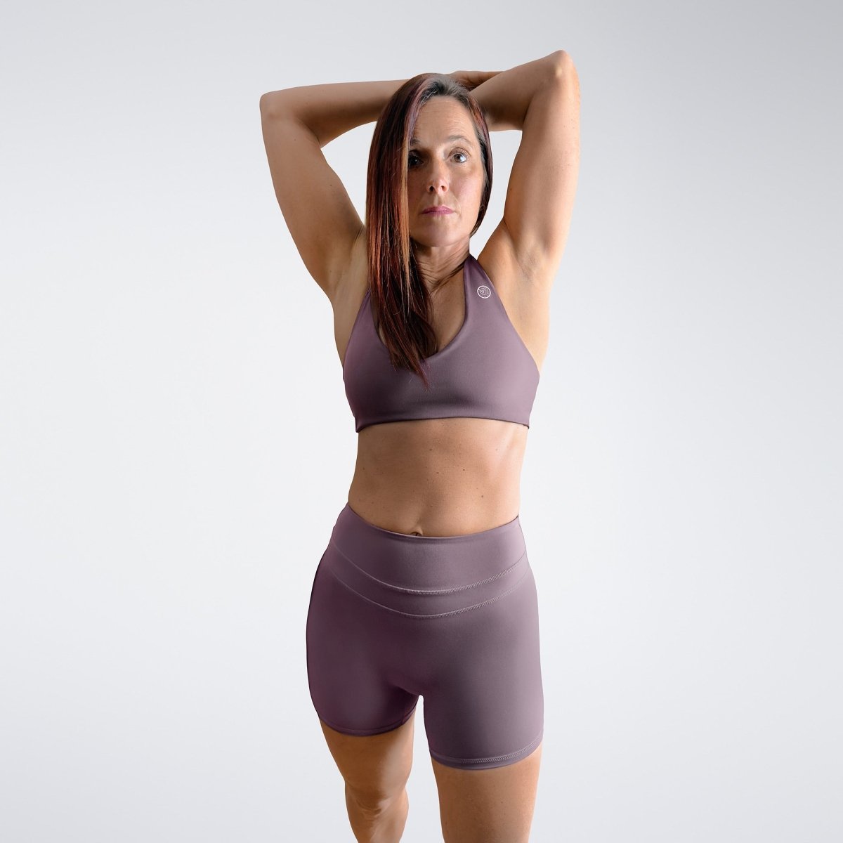 Shorts in plum on model - Halo Collection activewear