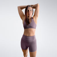 Shorts in plum on model - Halo Collection activewear
