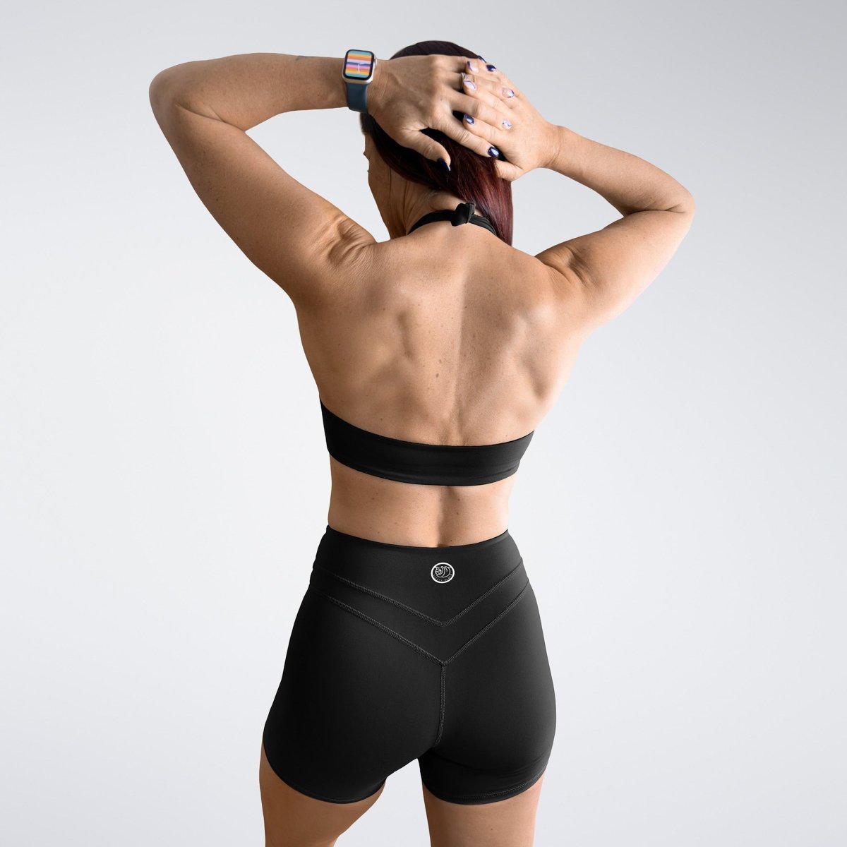 Shorts in black on model - Halo Collection activewear