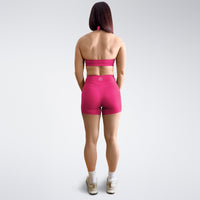 Shorts in hot pink on model - Halo Collection activewear