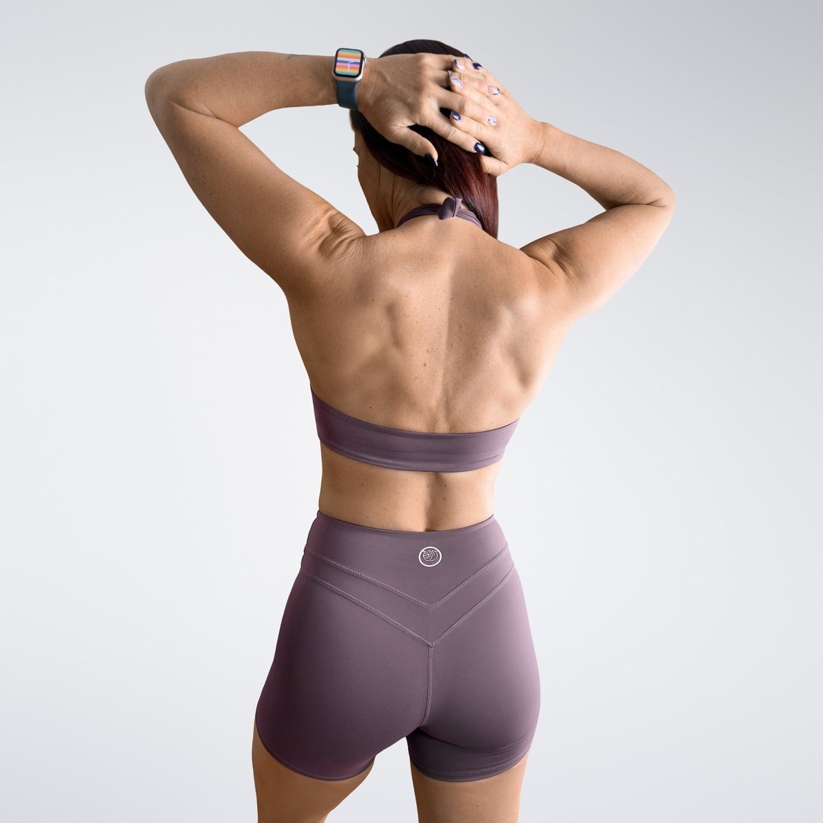 Shorts in plum on model - Halo Collection activewear