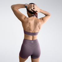 Shorts in plum on model - Halo Collection activewear