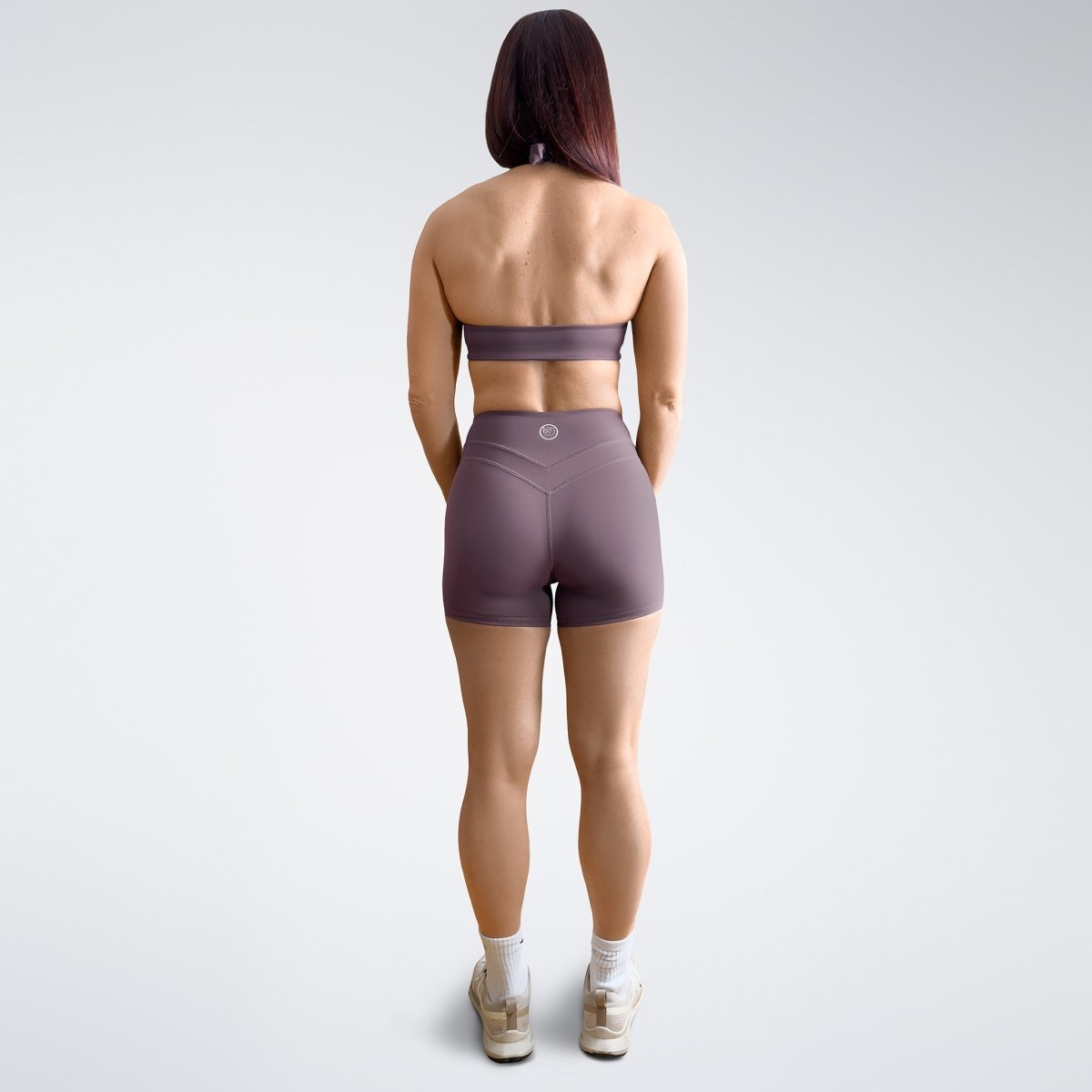Shorts in plum on model - Halo Collection activewear