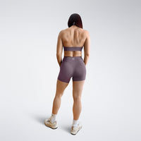 Shorts in plum on model - Halo Collection activewear