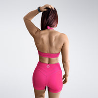 Shorts in hot pink on model - Halo Collection activewear