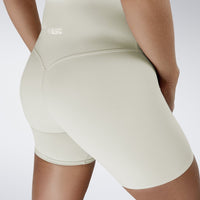 Shorts in ivory cream on model - Surge Collection activewear