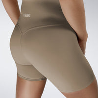 Shorts in coffee brown on model - Surge Collection activewear
