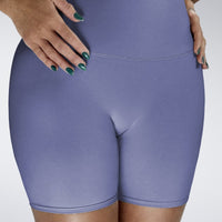 Shorts in purple on model - Surge Collection activewear