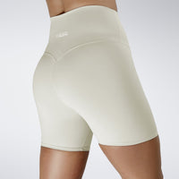 Shorts in ivory cream on model - Surge Collection activewear