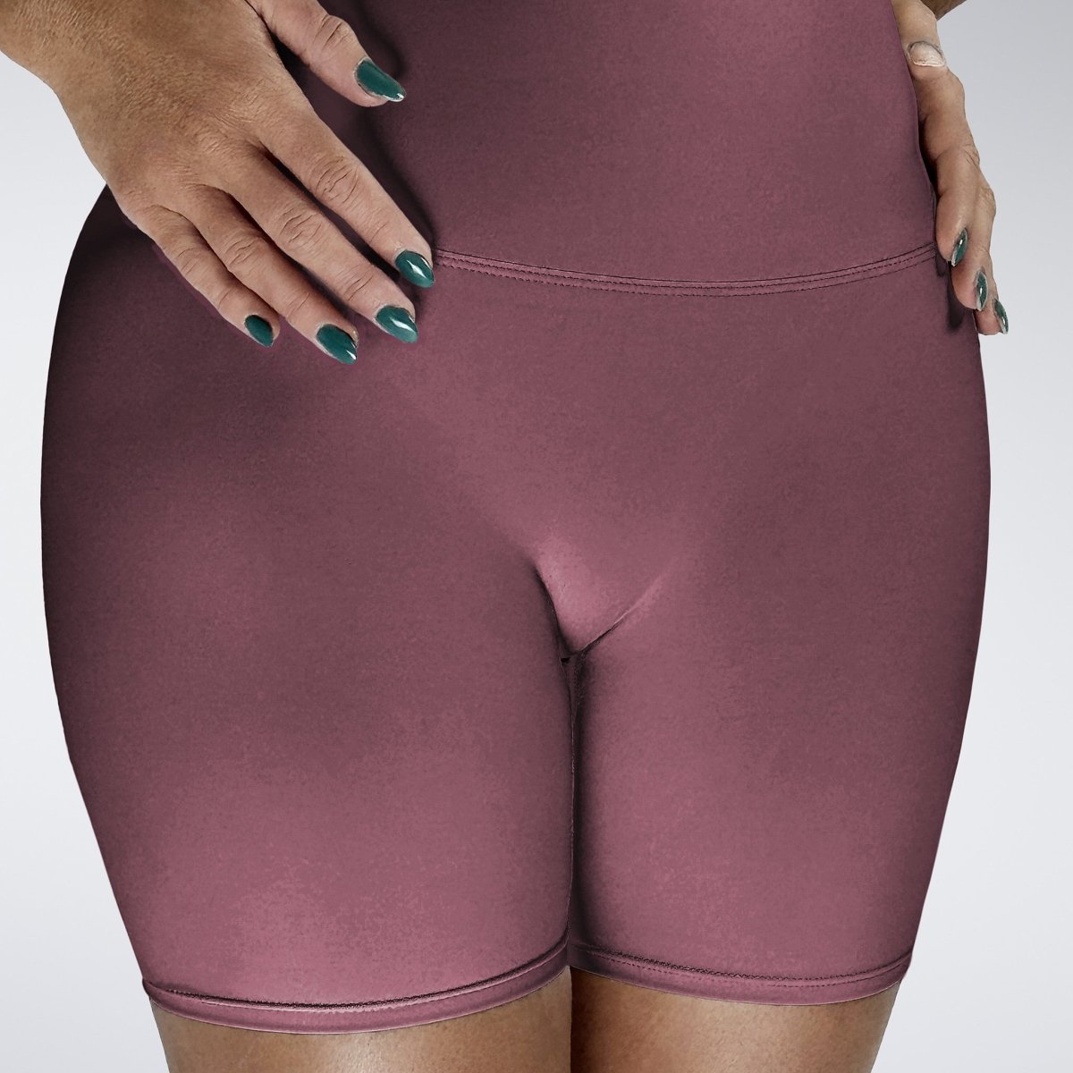 Shorts in burgundy on model - Surge Collection activewear