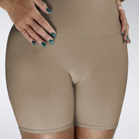 Shorts in coffee brown on model - Surge Collection activewear