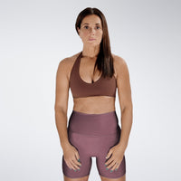 Shorts in burgundy on model - Surge Collection activewear
