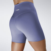 Shorts in purple on model - Surge Collection activewear