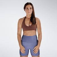 Shorts in purple on model - Surge Collection activewear