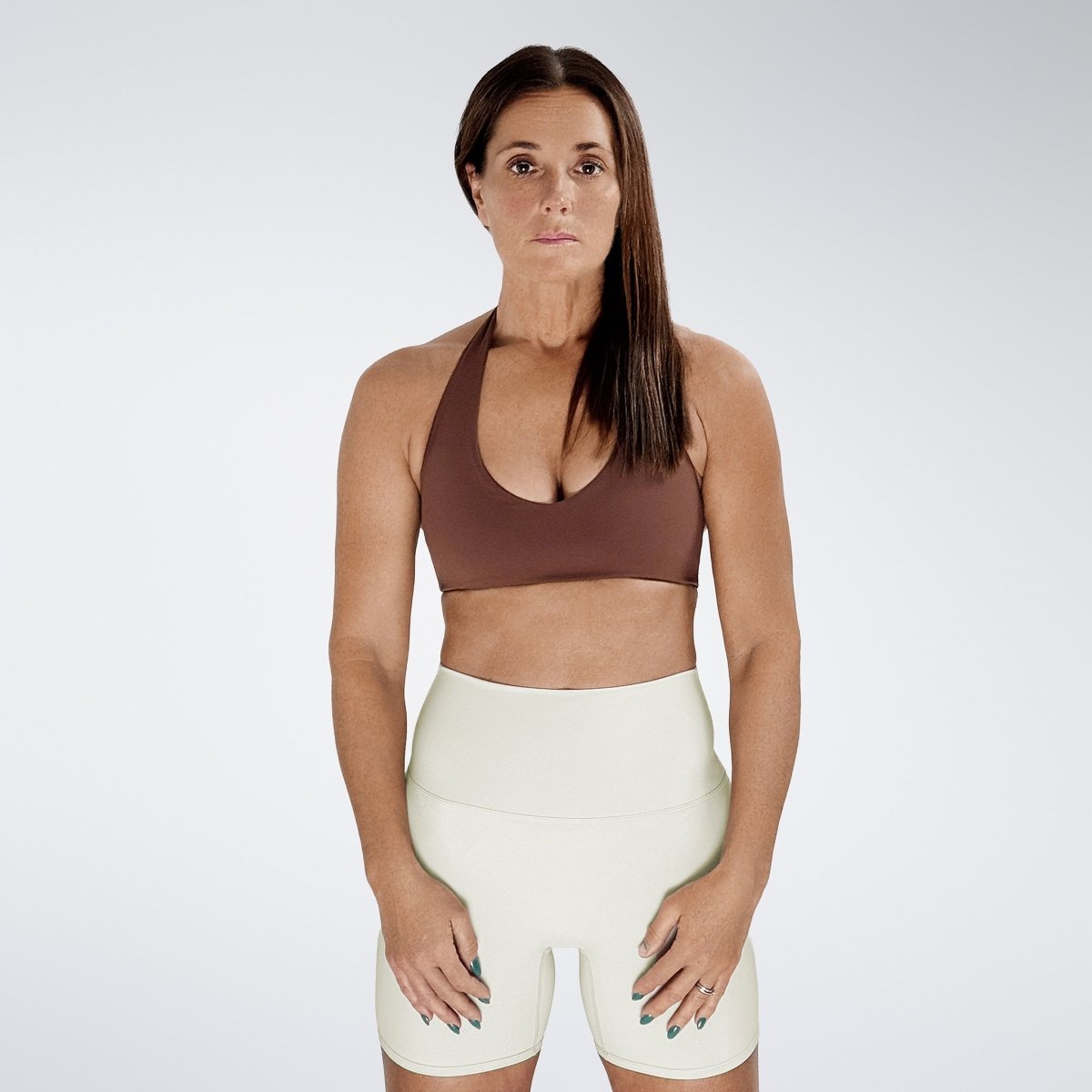 Shorts in ivory cream on model - Surge Collection activewear