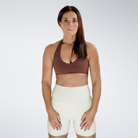 Shorts in ivory cream on model - Surge Collection activewear