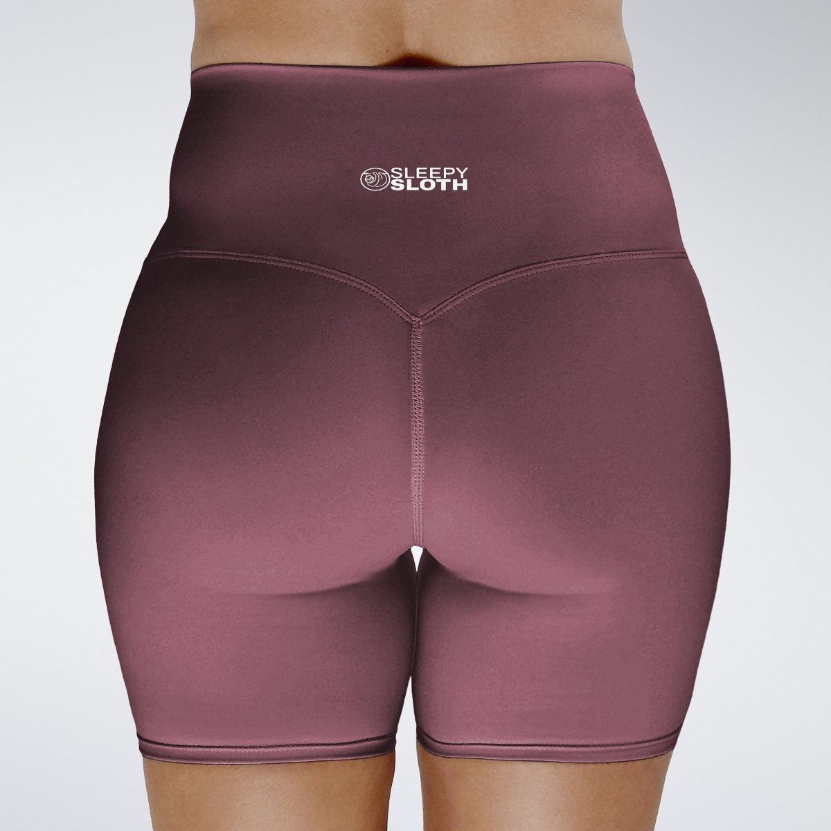 Shorts in burgundy on model - Surge Collection activewear
