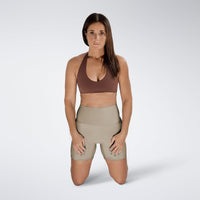 Shorts in coffee brown on model - Surge Collection activewear