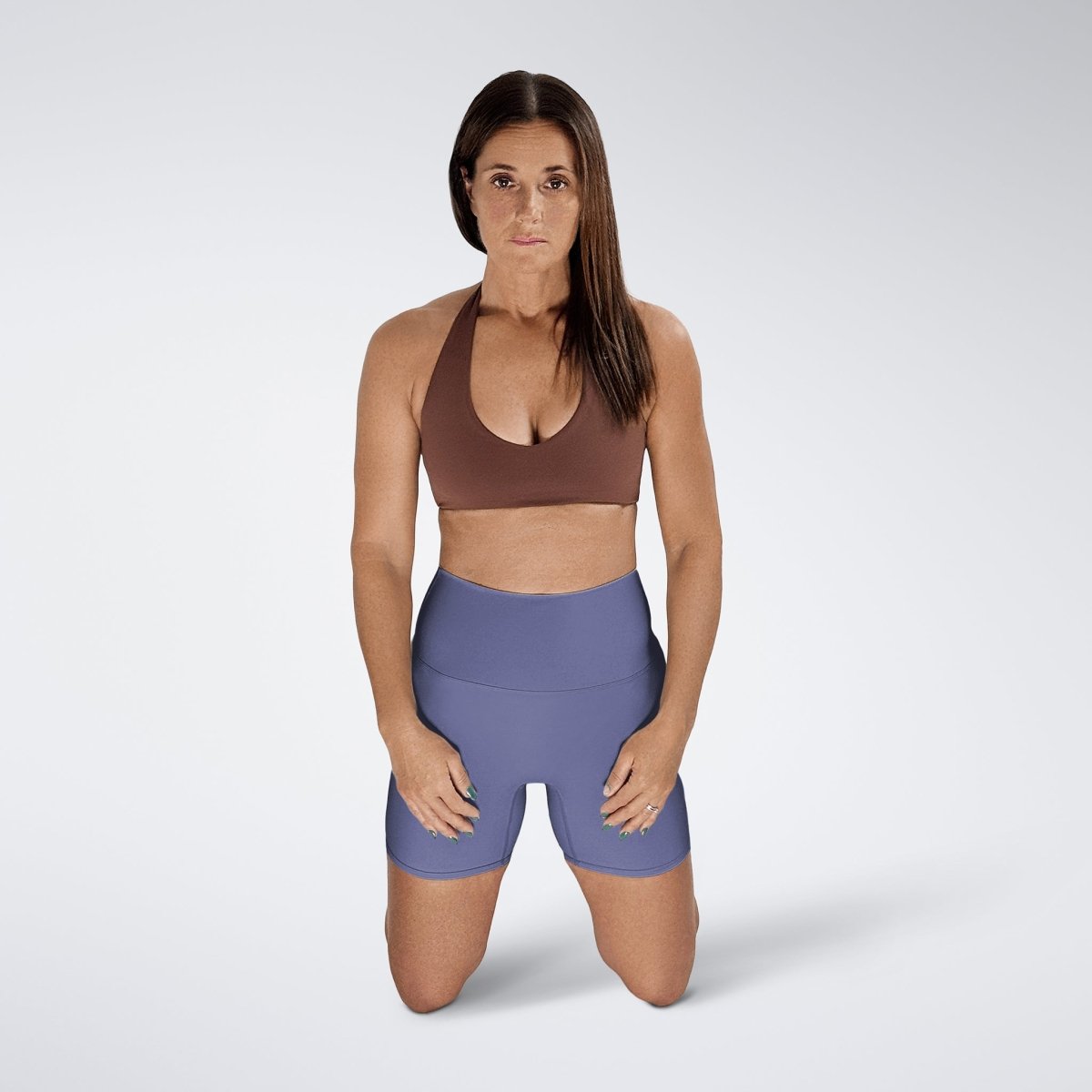 Shorts in purple on model - Surge Collection activewear