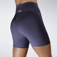 Shorts in navy on model - Surge Collection activewear