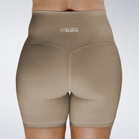 Shorts in coffee brown on model - Surge Collection activewear